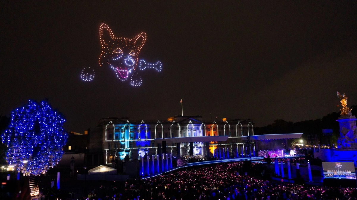 Lights in the sky, in the shape of a corgi dog above Buckingham palace